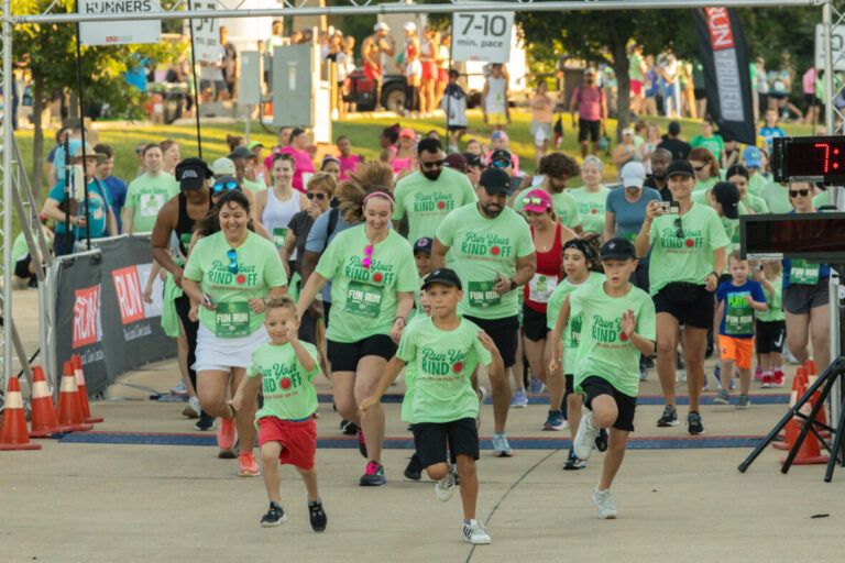 Melon Dash Fun Run start with kids and parents starting their run